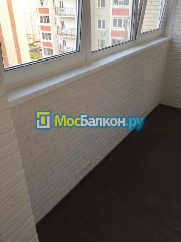 Остекление REHAU и обшивка искусственным камнем