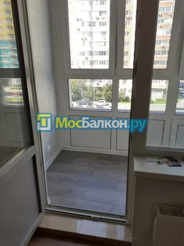 Отделка балконов ламинатом в Москве цены под ключ от МосБалкон